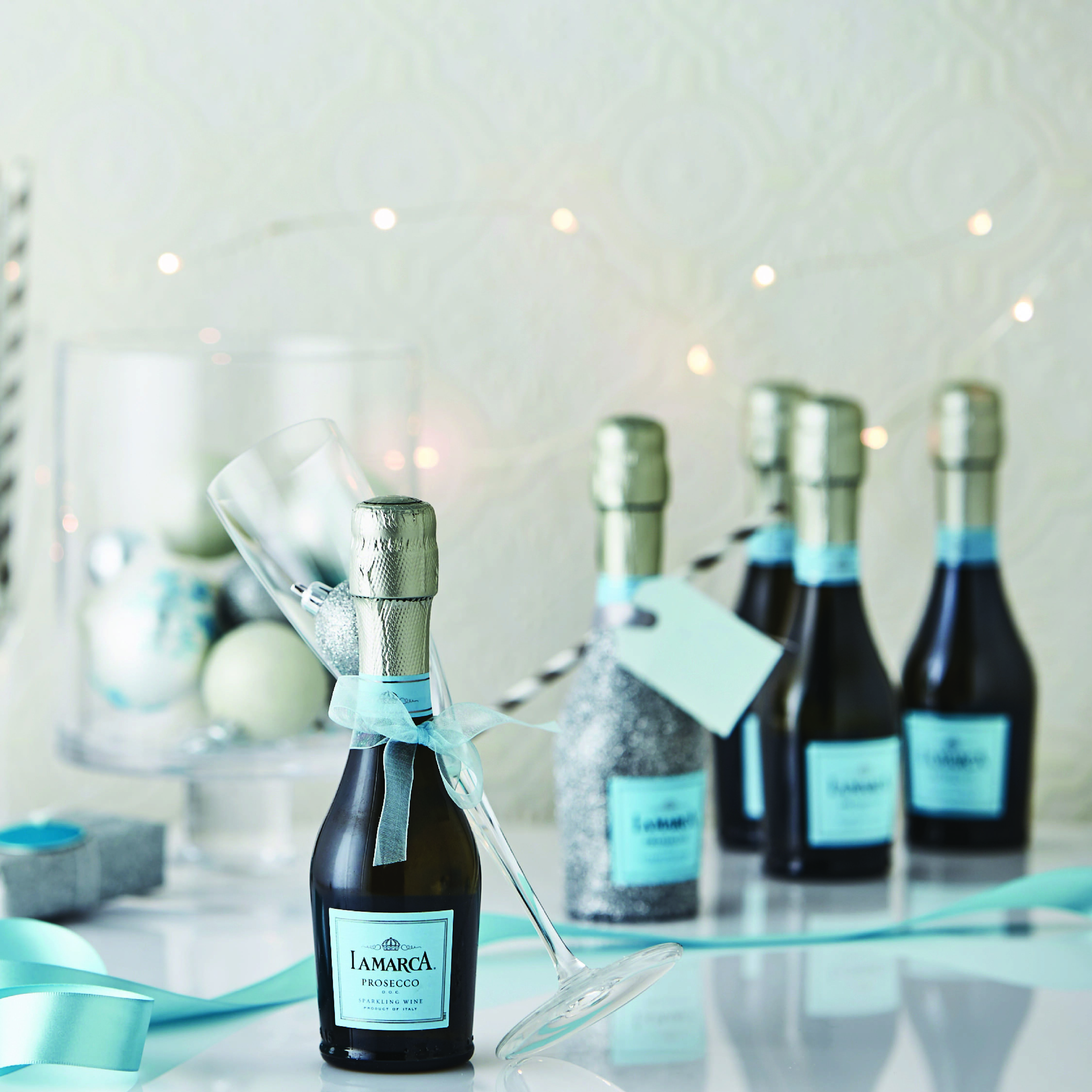 Women enjoying La Marca Prosecco Minis